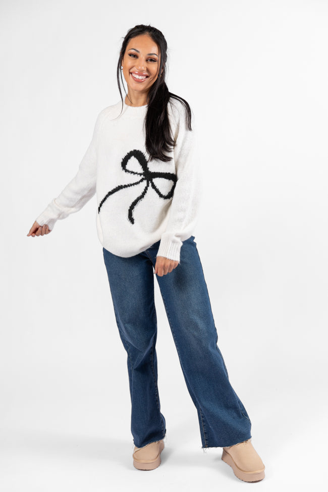 Feeling Like Love Ivory and Black Bow Crew Neck Sweater Explore