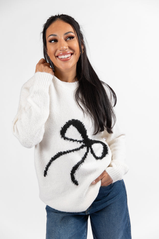 Feeling Like Love Ivory and Black Bow Crew Neck Sweater Explore